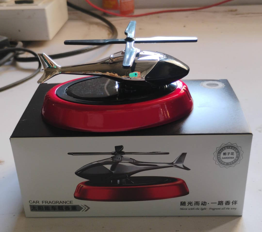 Solar-Powered Rotating Helicopter Car Air Freshener Solar-Powered Rotating Helicopter Car Air Freshener